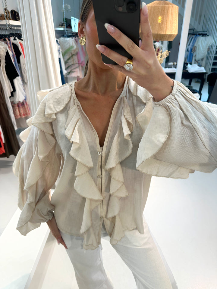 VALENCIA - Mjuk blus med volanger - Beige