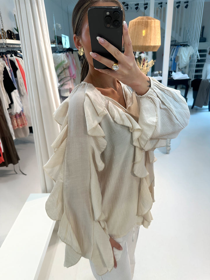 VALENCIA - Mjuk blus med volanger - Beige